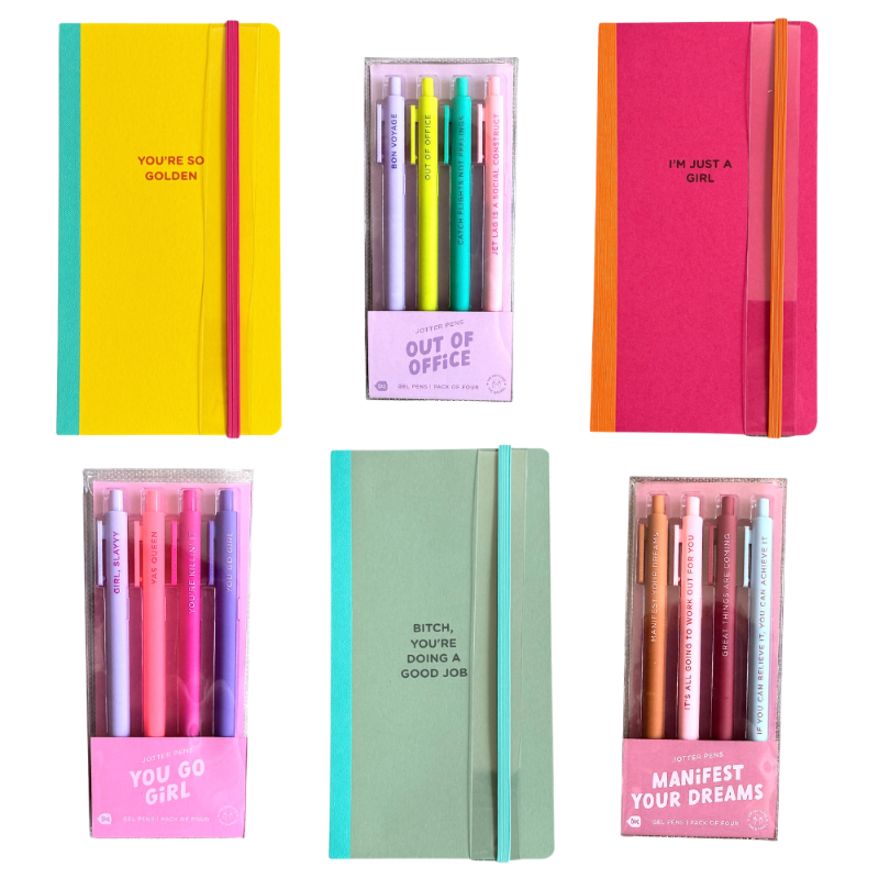 Six stationery items arranged on a white background: two hardcover notebooks with elastic closures, two boxed pens, and one mint hardcover notebook. The notebooks have bright covers in yellow, pink, and mint with printed phrases, and the pens are shown in pastel and metallic colors.