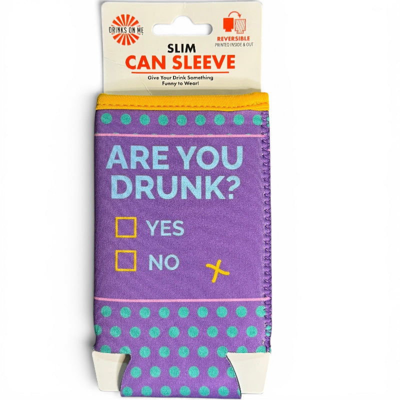 A novelty can sleeve in its retail packaging, featuring a purple body with teal polka dots, light blue text reading 'ARE YOU DRUNK?', and yellow checkboxes with a crossed-out mark. The top card shows the brand 'Screwed Up' and product type 'Slim Can Sleeve'.