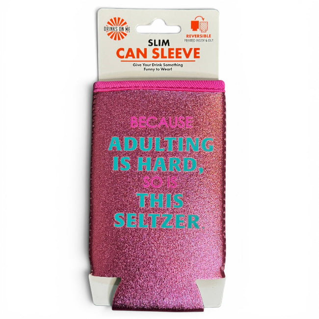 A pink glitter slim can sleeve with a white header card, featuring the text 'BECAUSE ADULTING IS HARD, SO I' THIS SELTZER' in pink and teal lettering.